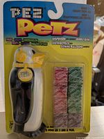 Front of sealed PEZ Petz Butler penguin dispenser with gum pads