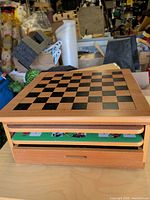 Wooden box with chessboard lid