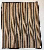 Full view of kilim showing overall striped design and dimensions
