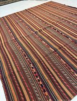 Full angled view of entire Kelim showing color and pattern