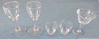 All five liqueur glasses side by side