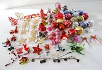 Lot overview showing various ornaments spread on surface