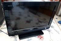 Front view of Sony Bravia 26-inch LCD TV on stand