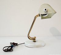 Desk lamp side view, showing base, arm and shade
