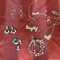 All seven jewellery pieces laid out