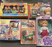 Group shot of all six packaged toys