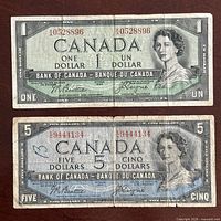 Both 1954 $1 and $5 Devil's Face banknotes front view