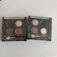 Front view of two Lancôme Colour Focus palettes showing shades and applicators