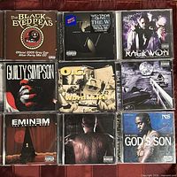 Front covers of all nine CDs laid out in three-by-three grid