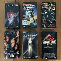 Front covers of six VHS tapes