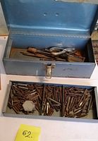 Toolbox open showing hand tools inside and tray removed