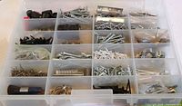 Overall view of organizer with assorted screws and hardware