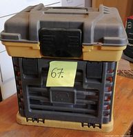 Gray and yellow Plano plastic toolbox front view