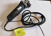 Full view of Ryobi AG402 grinder with cord