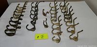 overview of mixed metal wall hooks grouped by type