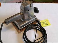 Overall view of Craftsman orbital sander with cord coiled