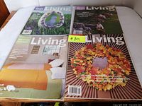 All four magazine covers visible