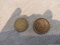 Both Belgian coins side-by-side front faces