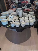 Top view of rectangular marble dining table laden with dishes