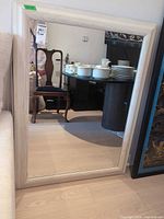 Full view of mirror reflecting room contents