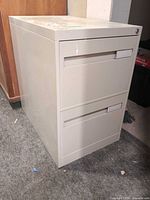Front and side view of metal two-drawer cabinet