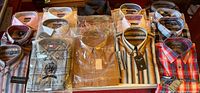 Overview of 16 packaged/new shirts laid out