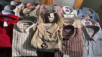 Overview of 20 shirts, assorted styles and brands