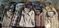 All 20 shirts laid out, showing patterns and packaging