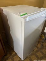 Full view of Arctic King white compact upright freezer