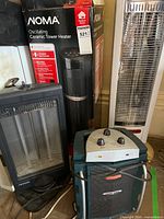 Boxed NOMA ceramic tower heater, NOMA halogen tower heater, Black+Decker portable heater, black NOMA heater