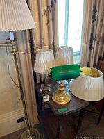 Group view of all four lamps and multiple pleated shades