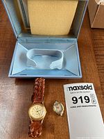 Lot overview showing both watches and presentation box