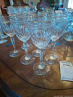 Front view of grouped crystal wine glasses on table