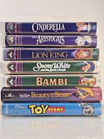 Stack view showing spines of all seven VHS titles