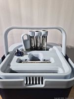 top view of bucket showing wringer insert and handle