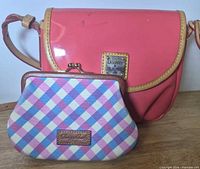 Front view of both Dooney & Bourke items: crossbody purse and plaid coin purse