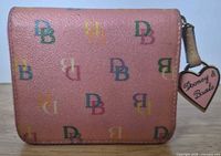 Front view of pink multicolor DB logo wallet