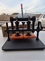 Front view of the Uimoso manual leather cutting press