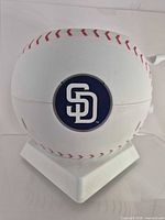 Front view showing Padres logo on baseball-shaped toaster