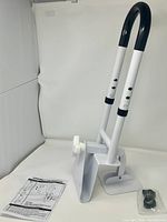 Grab bar assembled with instruction sheet and hardware