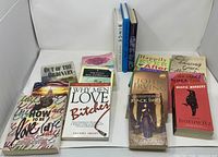 All books laid out showing titles and spines