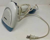 Full view of Conair ExtremeSteam handheld steamer with cord