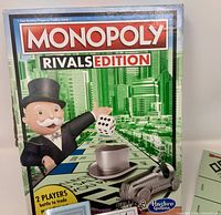 Front of Monopoly Rivals Edition box showing branding and age/player info