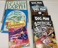 Group shot of all six books, covers visible