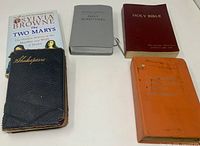 Group shot of all five books showing covers