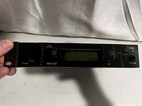 Front panel showing LCD, buttons, indicators and headphone jack