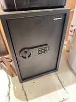 Front view of AmazonBasics safe showing keypad and handle
