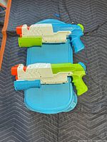 Top view of both water blasters showing colors and design details
