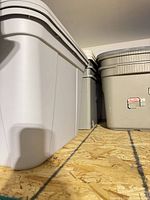 Side view of white/light gray tote and adjacent gray tote