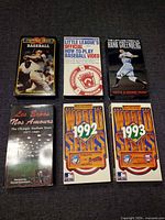 Front covers of all six VHS tapes arranged 3x2